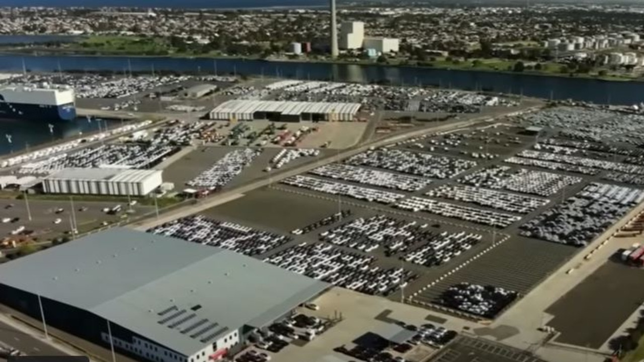 Thousands of unsold cars in a parking lot in Port Melbourne.