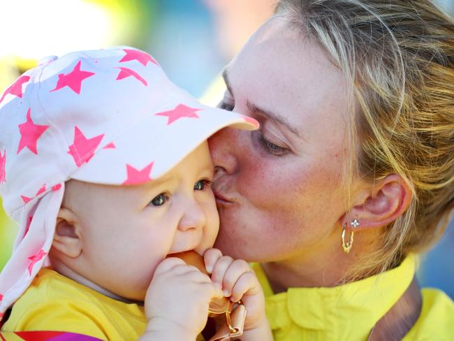 Commonwealth Games 2018 - Kelsey Cottrell with her baby Sienna of Australia during after winning Gold for the Lawn Bowls Women's Fours at the XXI Commonwealth Games at the Broadbeach Bowls Club.Picture: NIGEL HALLETT