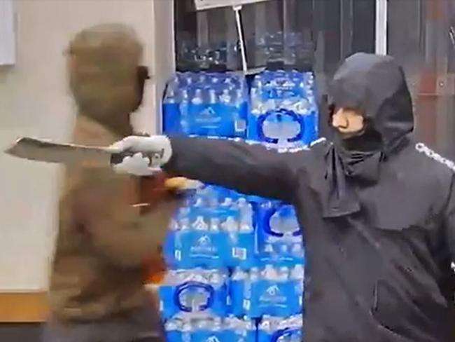 CCTV captures iced-up teen in balaclava rob busy bottle-o