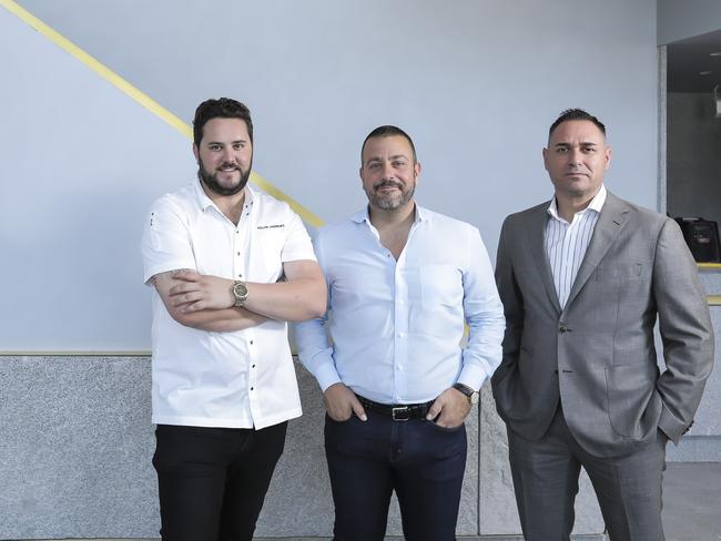 Kelvin Andrews, Simon Gloftis and Theo Kampolis at their new restaurant SK Steak &amp; Oyster in The Calile Hotel precinct. Picture: Mark Cranitch