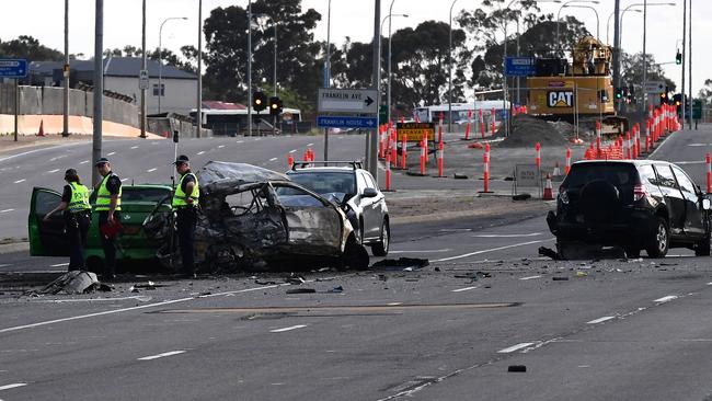 The scene of a fatal crash at the entrance to the Southern Expressway in Bedford Park, where a mother of two died when her car was struck by a stolen ute in October. Picture: Campbell Brodie