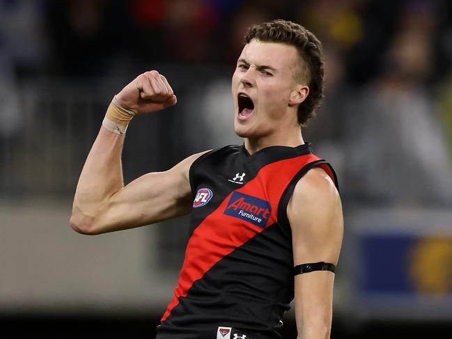 PERTH, AUSTRALIA - MAY 29: Nikolas Cox of the Bombers celebrates a goal during the round 11 AFL match between the West Coast Eagles and the Essendon Bombers at Optus Stadium on May 29, 2021 in Perth, Australia. (Photo by Paul Kane/Getty Images)