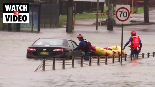 Weather Watch: Man dies as wild weather lashes NSW