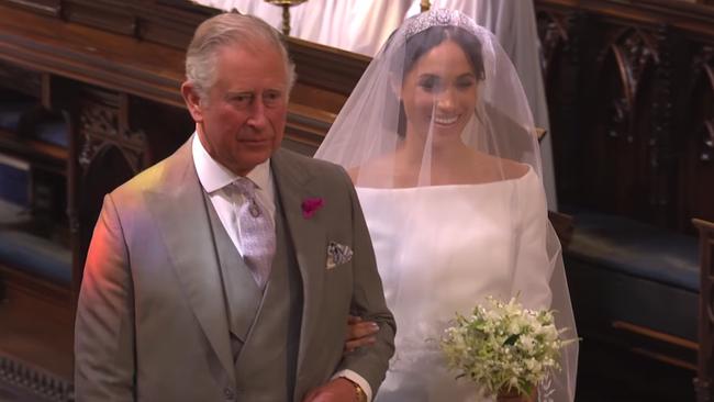 Prince Charles “accompanied” Meghan to the altar, he didn’t “give her away”. Picture: BBC