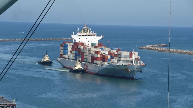 A container ship arrives at Outer Harbor. Picture: Roger Wyman