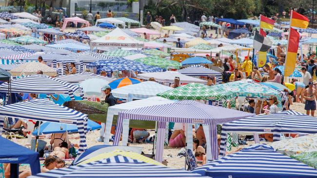 Expect even bigger crowds at your favourite beach in 2071. Picture Lachie Millard