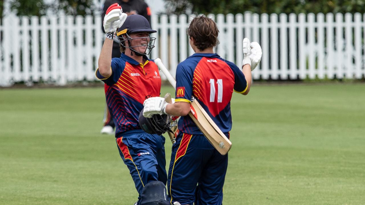 Good mates. Mosman’s Alex Lee-Young celebrates his century with Will Adlam.