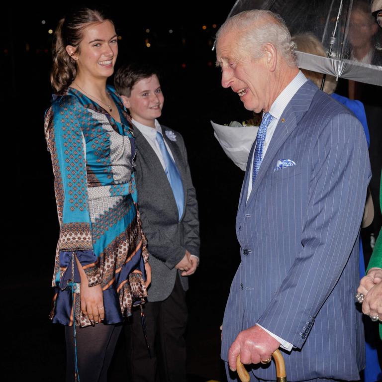 The siblings presented a bouquet of flowers to Queen Camilla on the tarmac at Sydney International Airport in Sydney on October 18. Picture: Brook Mitchell/POOL/AFP