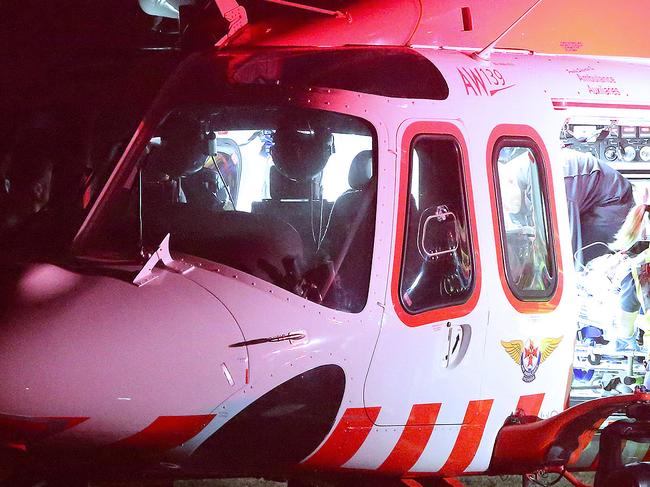 KALORAMA, VICTORIA - MARCH 16: The patient is loaded into the air ambulance. CNR Mt Dandenong Tourist Rd and Childs Rd on March 16, 2018 in Kalorama, Victoria. (Photo by Patrick Herve) Fees Exist.