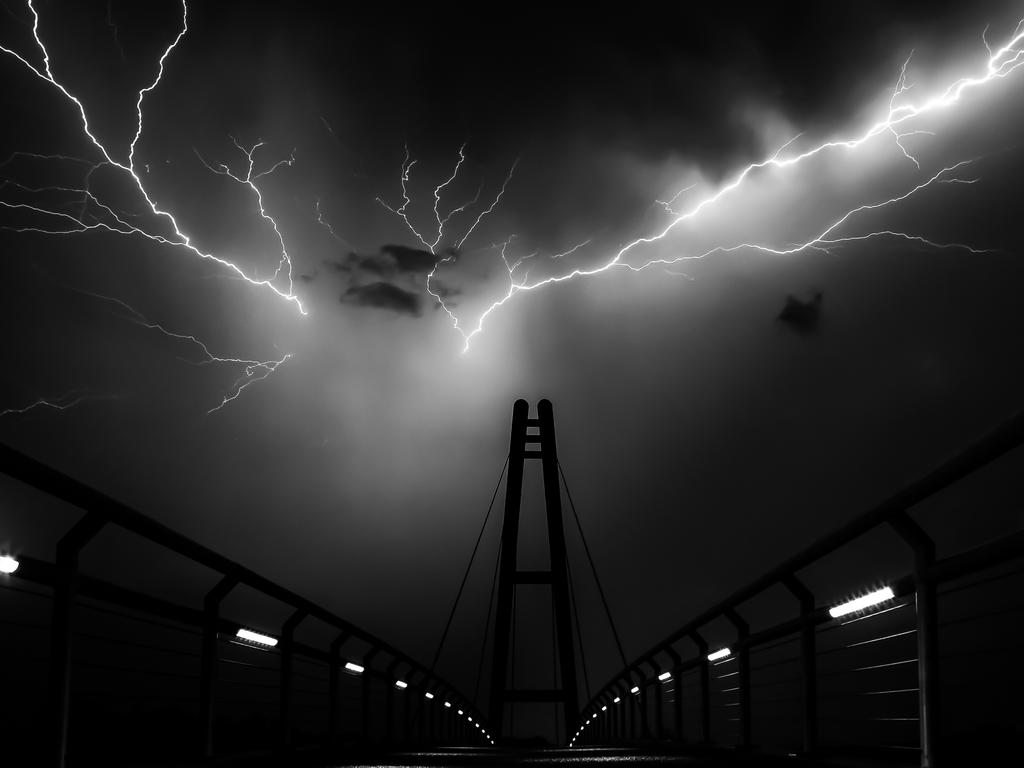 “The Nelson-Mandela-Bridge in Ilmenau (Germany) during a heavy summer thunderstorm. Two intense lightnings illuminate the whole bridge.” Picture: Stefan Liebermann, Germany, Shortlist, Open Low Light, 2016 Sony World Photography Awards