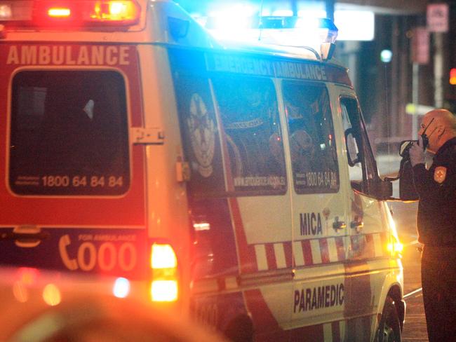 Melbourne's streets after the 2am lockout was trialled for the first busy weekend. Nightclub. Violence. Ambulance crews along Swan St in relation to a bottle attack.