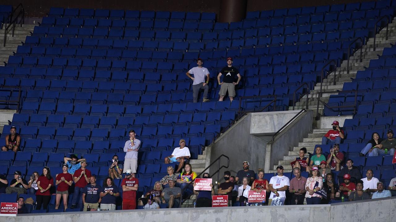 President Donald Trump supporters attend a campaign rally in Tulsa, Okla. Picture: AP Photo/Evan Vucci