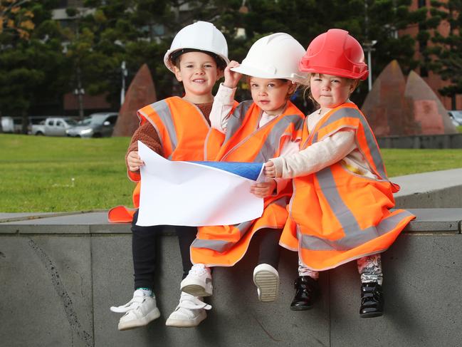 Asher, Eli and Elisie plan for the future of Geelong. Three Geelong children building a better future for Geelong. To go with the launch of the Future Geelong Awards, future leaders of the region in construction gear, ready to help build Geelong's future. Picture: Alan Barber