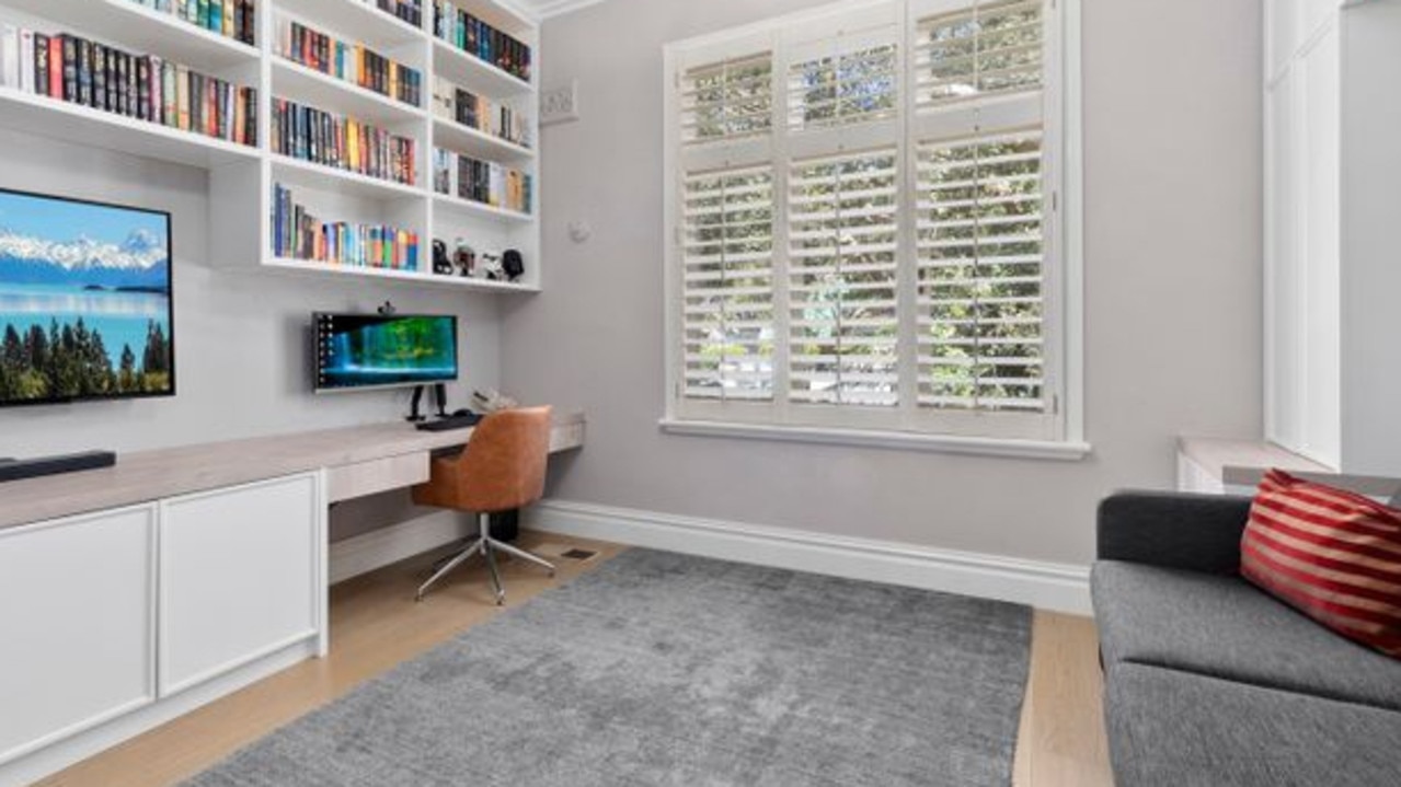 The couple added bespoke joinery to the fourth bedroom, which they use as a study.