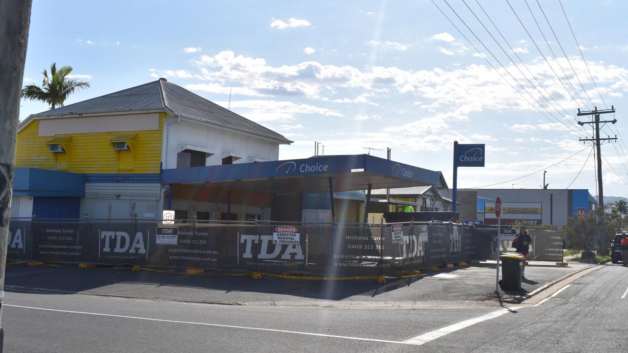 Demolition workers on site at the Wandal Choice service station on Friday (October 8).