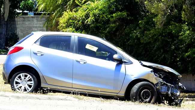 Traffic along University Drive, Annandale was brought to a standstill after a two vehicle crash ended with a car on its side. Picture: KATE BANVILLE