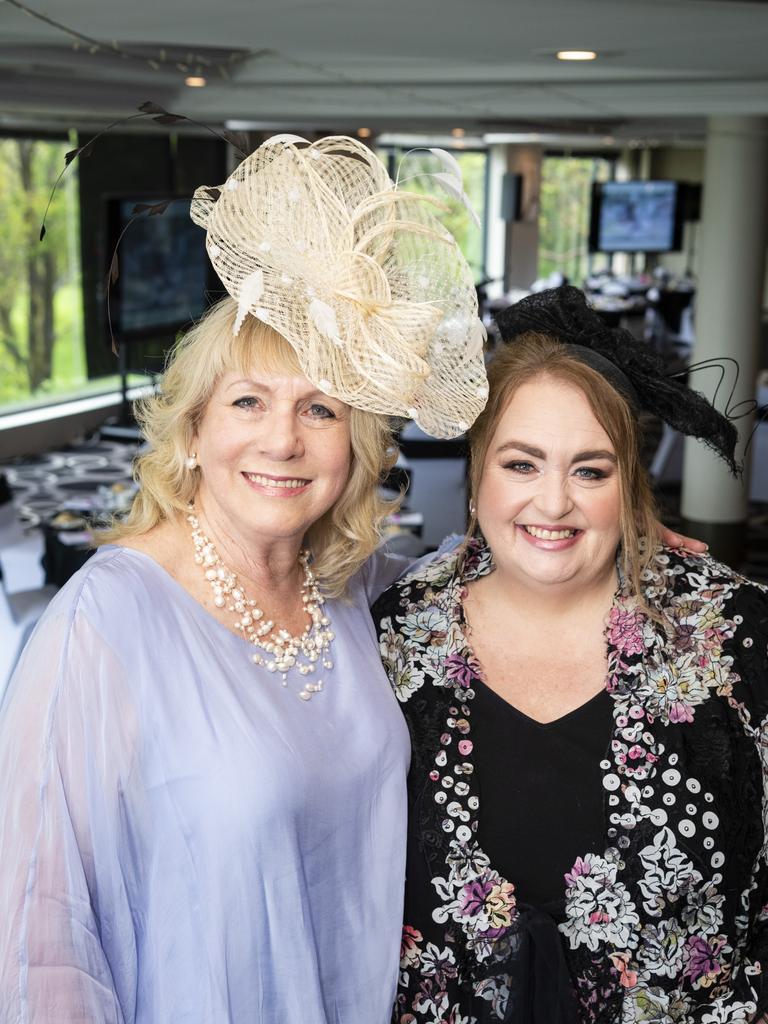 Maree Schwerin (left) with event co-MC Kim Stokes at the Melbourne Cup luncheon hosted by Rotary Club of Toowoomba City raising funds for Protea Place, Tuesday, November 1, 2022. Picture: Kevin Farmer