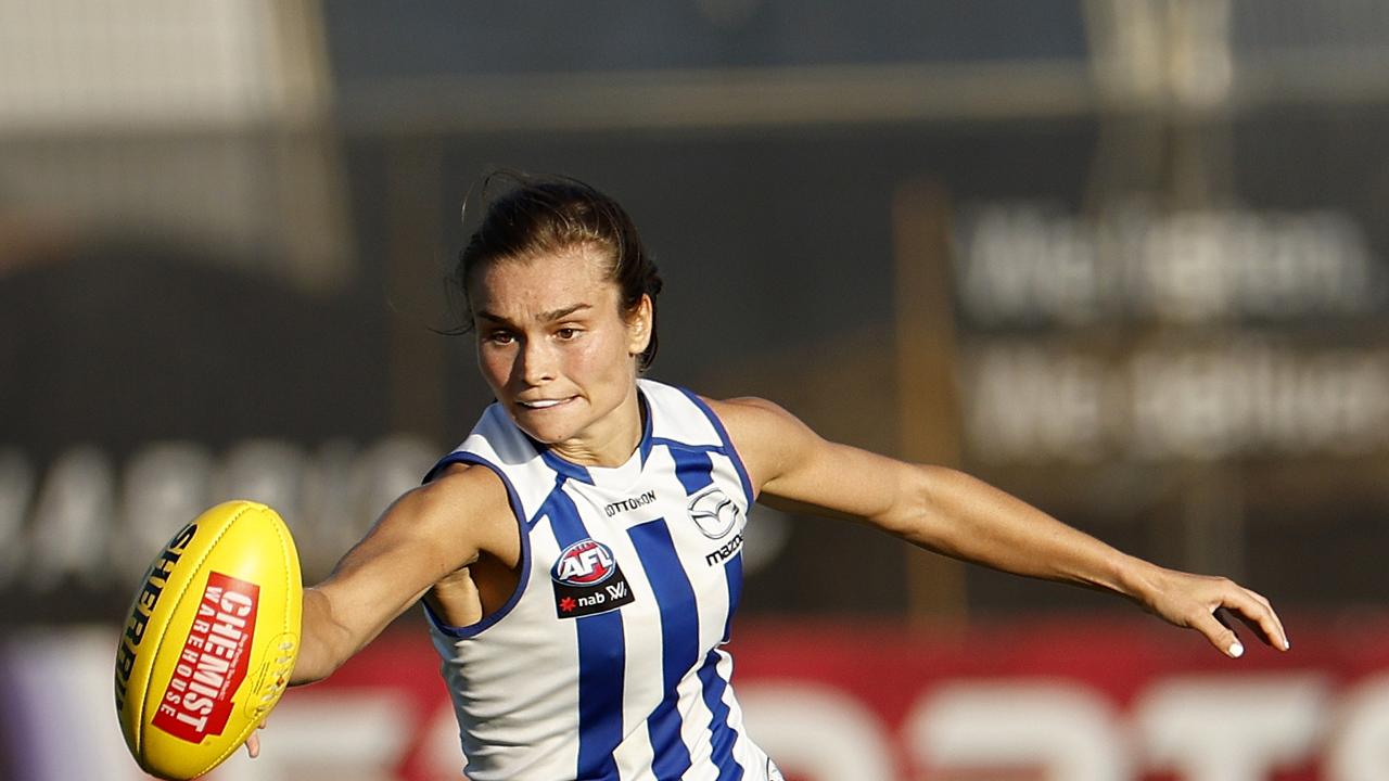 MELBOURNE, AUSTRALIA - MARCH 12: Ashleigh Riddell of the North Melbourne Kangaroos in action during the round 10 AFLW match between the North Melbourne Kangaroos and the West Coast Eagles at Arden Street Ground on March 12, 2022 in Melbourne, Australia. (Photo by Jonathan DiMaggio/Getty Images)