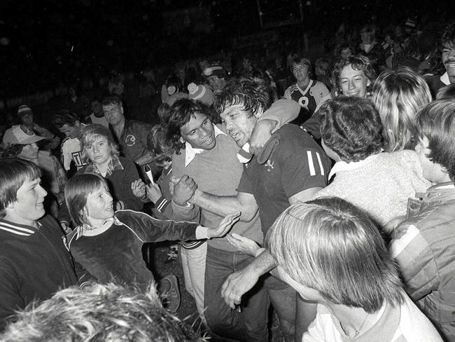 Artie Beetson is swamped by fans after the first State of Origin.