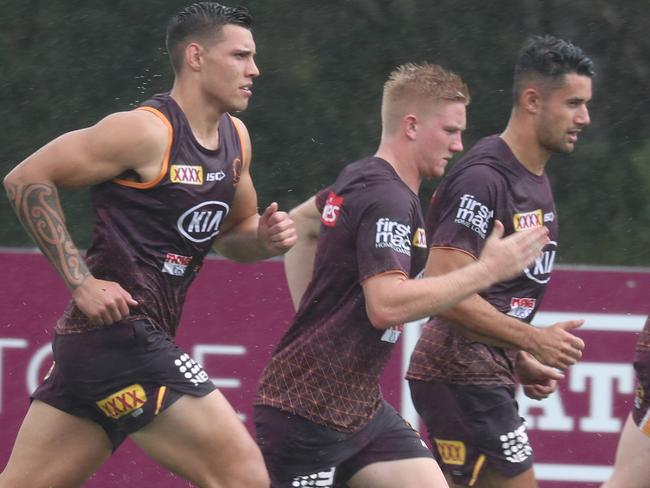 Patrick Carrigan and Tom Dearden and Jesse Arthars at Broncos training. Pic Annette Dew