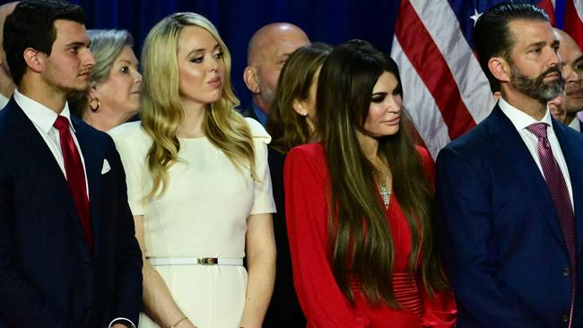 From right to left: Donald Trump Jr, Kimberly Guilfoyle, Tiffany Trump and her husband Michael Boulos, all on stage during Mr Trump’s election night victory speech. Picture: Jim Watson/AFP