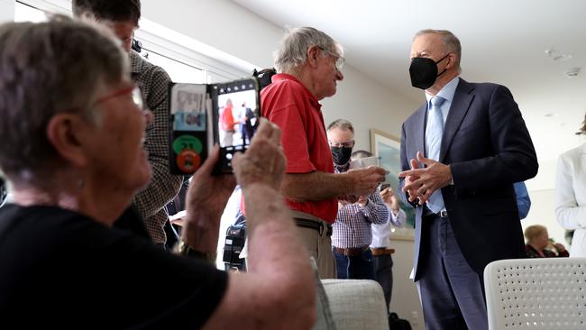 Labor leader Anthony Albanese wears a facemask while visting Symons House Retirement Village in Nowra. Picture: Toby Zerna