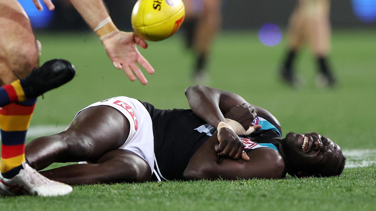 Aliir Aliir was visibly distressed. Photo by Sarah Reed/AFL Photos via Getty Images.