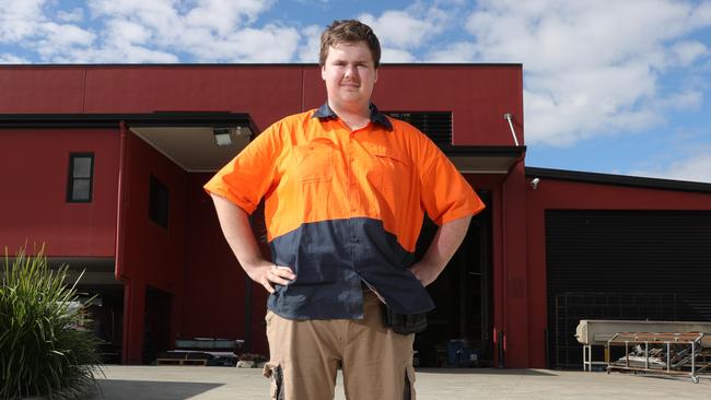 Coomera's Joshua Pollard, 17, at work in his new uniform. Picture: Glenn Hampson