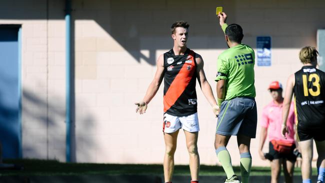 Ryan Spittle reacts while getting yellow-carded by an umpire during the Goodwood Saints versus Tea Tree Gully game in April. Picture: AAP/Morgan Sette.