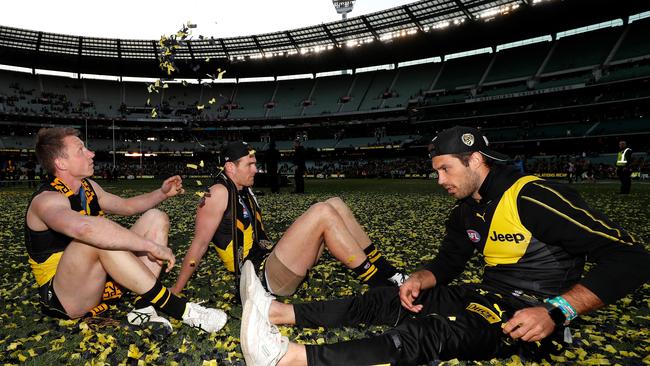 Alex Rance chats with David Astbury and Dylan Grimes post-match. Picture: Michael Willson/AFL Photos via Getty Images.