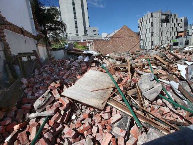 Rubble at the site of the former pub. Picture: David Crosling