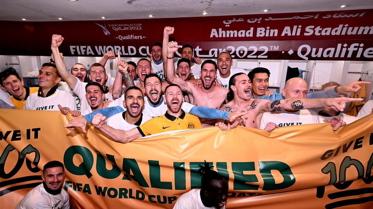 Australia celebrates their win over Peru in the changing room following the 2022 FIFA World Cup.