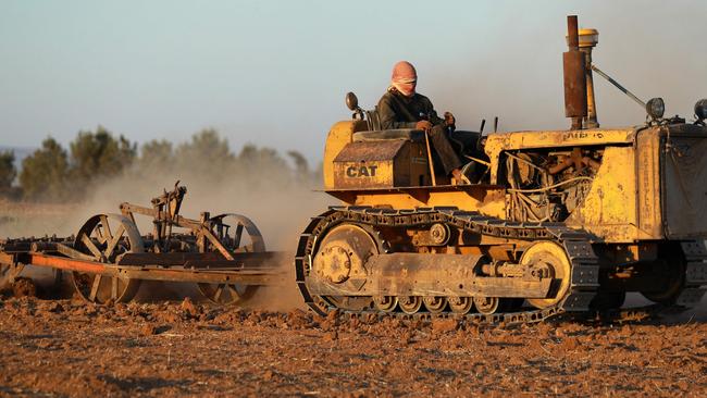 A farmer ploughs a wheat field in the countryside of the northeastern city of Qamishli. Food insecurity still plagues many nations across the world. Picture: Deli Souleiman.