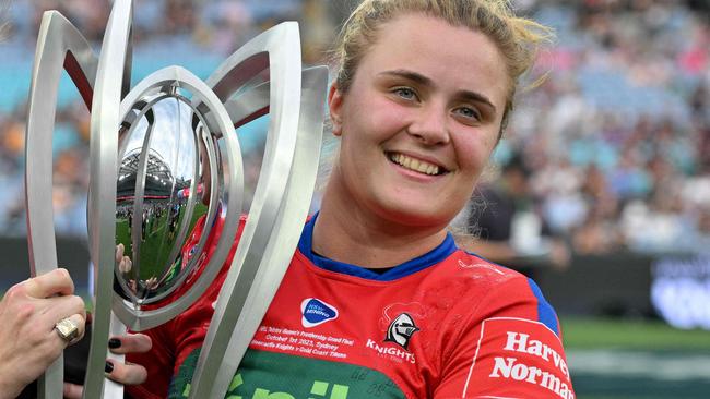 Tamika Upton (L) and Hannah Southwell (R) of the Knights pose with the Premiership Trophy after winning the women's 2023 NRL Grand Final between the Newcastle Knights and Gold Coast Titans at Accor Stadium in Sydney on October 1, 2023. (Photo by Izhar KHAN / AFP) / -- IMAGE RESTRICTED TO EDITORIAL USE - STRICTLY NO COMMERCIAL USE --