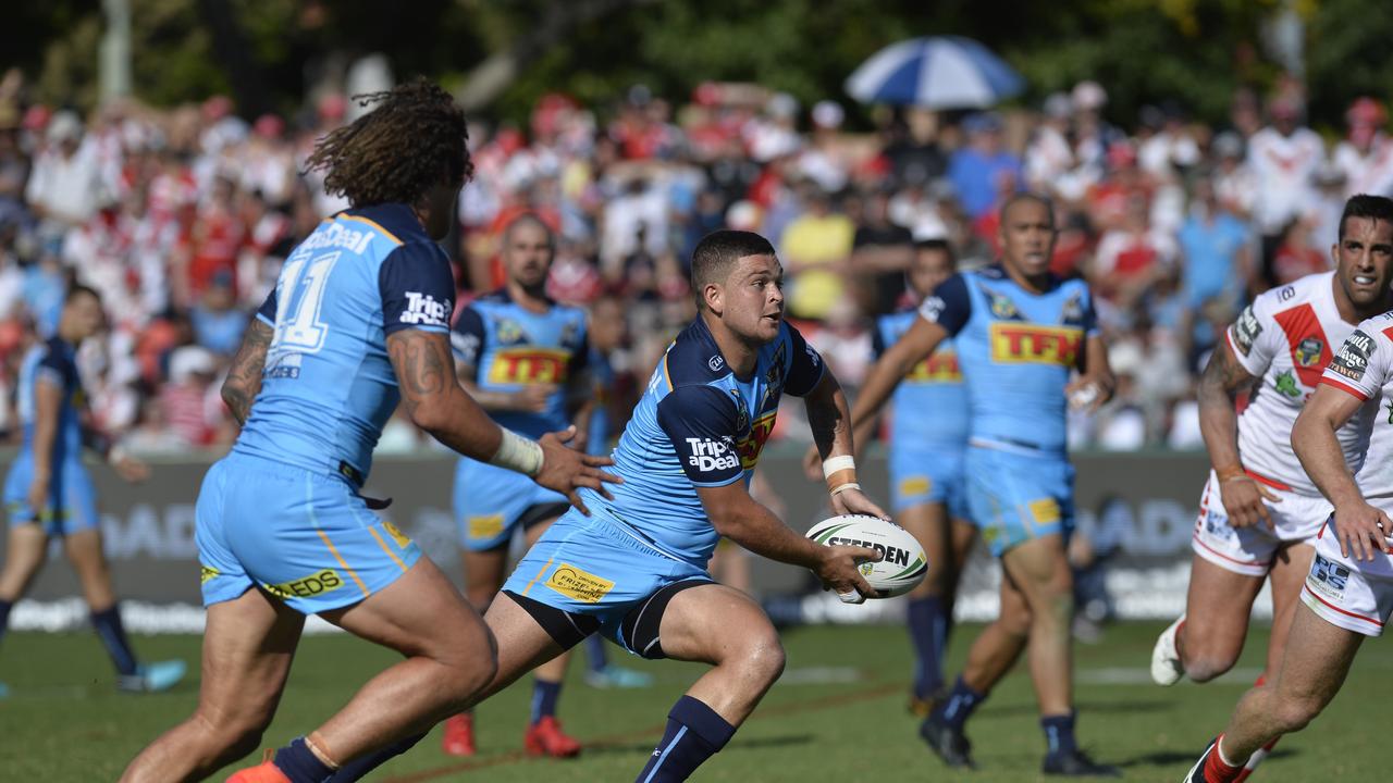 Ash Taylor takes on the Dragons line during the round 3 NRL game played at Clive Berghofer Stadium in 2018.