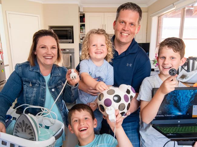 Mother-of-three Nikki Brownlie, 41, and her husband Craig, 46, are savvy with their energy deals and are always looking to save. They have switched retailers three times in the past five years, with their children Hamish, 3, Austin, 10, and Kaylan, 11. Picture: Jason Edwards