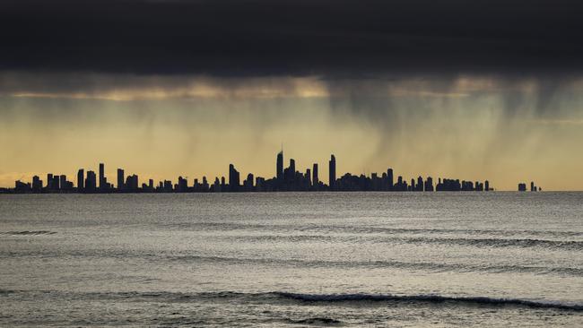 Rain falls over the Gold Coast skyline on wet cold winter’s day. Photo Scott Powick Newscorp