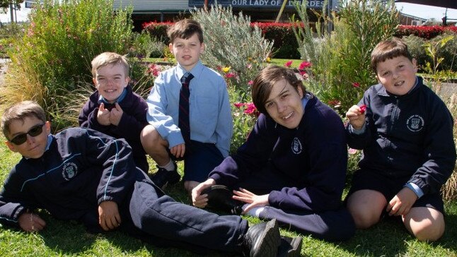 Our Lady of Lourdes students (left to right) Darius Lait, Tyler Shakespeare, Levi Roberts, Tim Furminger and Ben Vidler helping the school prepare for the The Chronicle Garden Competition 2021.