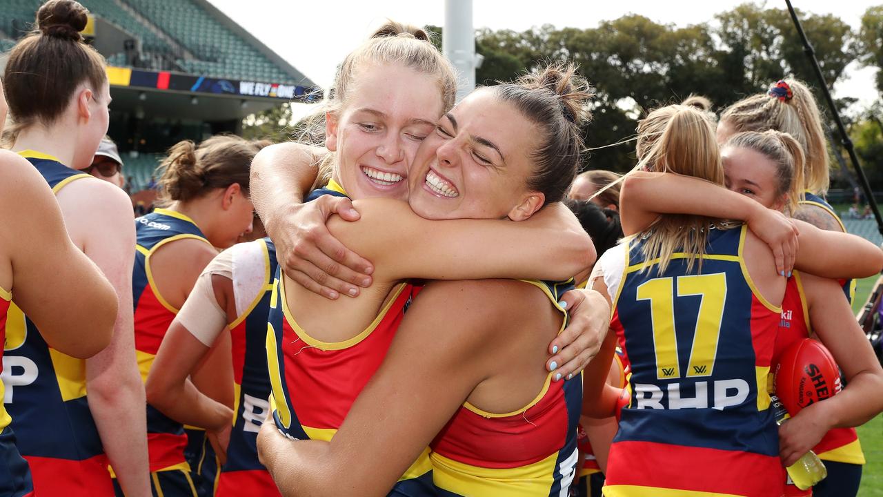 Crows teammates Teah Charlton and Ebony Marinoff celebrate a win. Picture: Sarah Reed