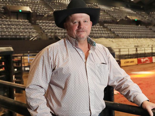 The Professional Bull Riders Cairns Invitational will be held on Saturday night at the Cairns Convention Centre. PBR General Manager Glenn Young is looks out over the construction of the arena from the release shutes. Picture: Brendan Radke