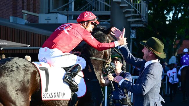 Ryan Maloney and Ciaron Maher cause a Group 1 Queensland Oaks boilover with Socks Nation at Eagle Farm. Picture: Grant Peters – Trackside Photography