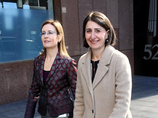 Premier Gladys Berejiklian and NSW Minister for Local Government Gabrielle Upton arrive at a press conference to declare council amalgamations dead on Thursday.