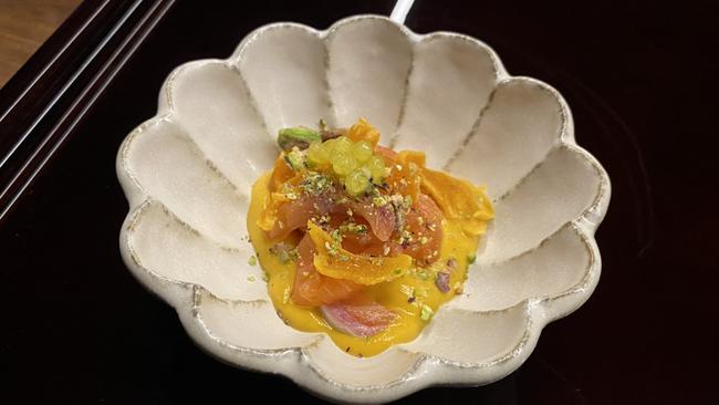 The cured salmon with persimmon and pumpkin puree at Korean Butterfly restaurant in Woolloongabba.