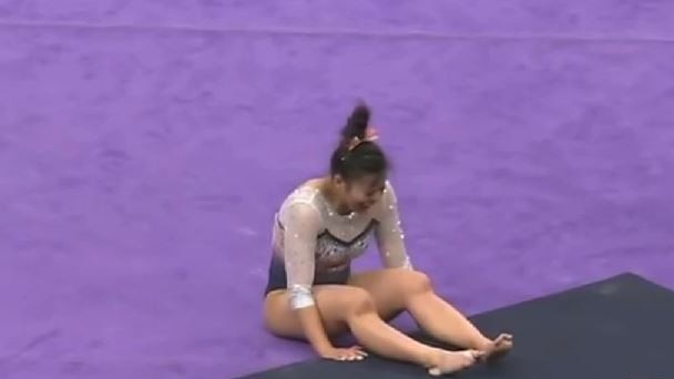 Samantha Cerio writhes in pain after misjudging her landing.