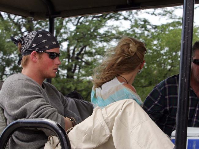 Prince Harry on a safari in Botswana with former girlfriend Chelsy Davy. His safari with Meghan “clinched the deal”. Picture: Terry Bradford