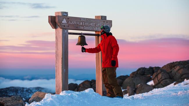 Ringing the bell at Karels, Thredbo.