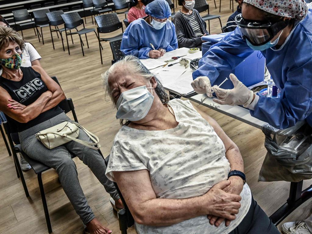 A woman is inoculated with the Oxford/AstraZeneca COVID-19 vaccine in Medellin, Colombia, on April. Picture: Joaquin Sarmiento / AFP