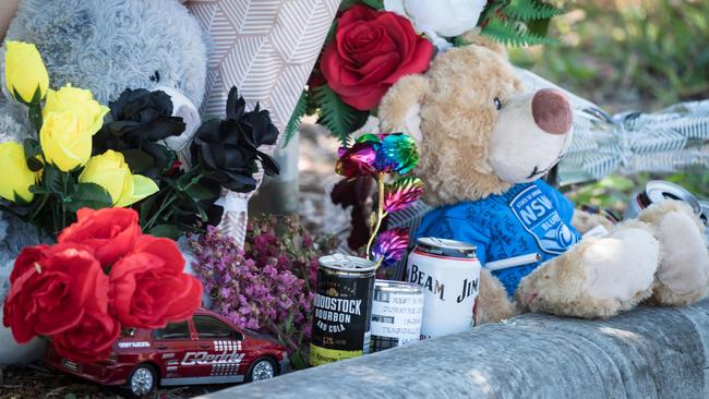 Tributes were left outside the home on Woodland Street, Wodonga. Photo: Simon Dallinger.