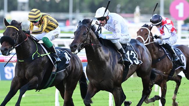 The Annabel and Rob Archibald-trained Libertad (white) wins the Victory Stakes at Eagle Farm on Saturday. Picture: Grant Peters/Trackside Photography.
