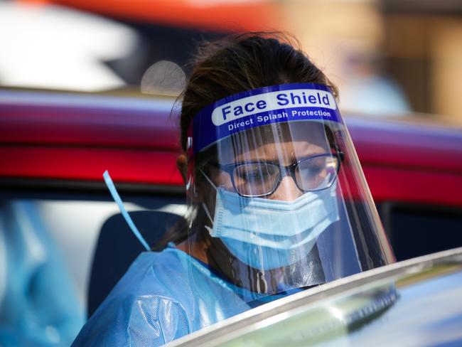 SYDNEY, AUSTRALIA - NewsWire Photos DECEMBER 09 2020: Nurses seen working at the Killara Drive Thru Covid Testing clinic in Sydney Australia. Picture: NCA NewsWire / Gaye Gerard